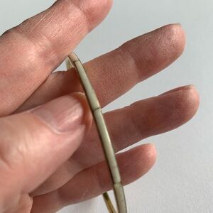 Delicate vintage bone and brass bangle.